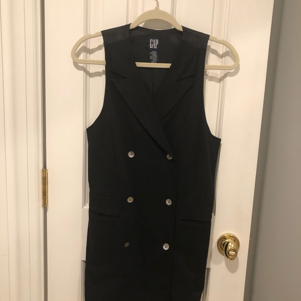 Gap double breasted vest with pockets & back tie.